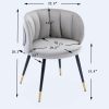 Grey velvet lounge chair, black metal feet, unique back design, suitable for office, living room, bedroom